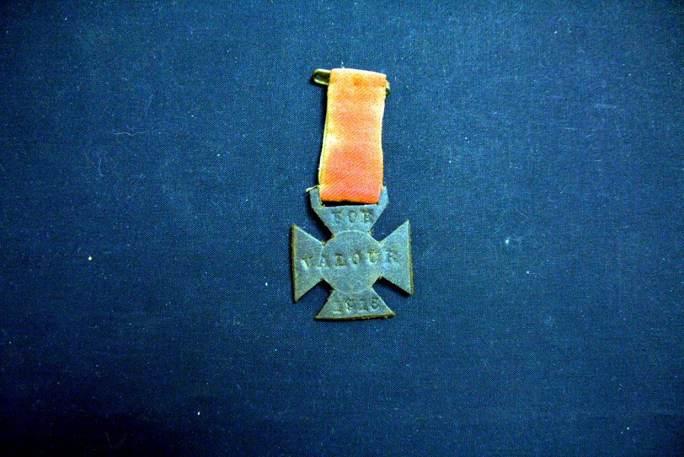 Leather Cross Badge Belonging to Michael Burns