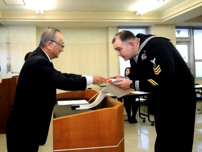 Legalman 1st Class Donald McDowell recognized by Misawa, Japan Tourism Association 160122-N-EC644-009