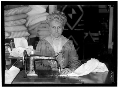 LEGION OF LOYAL WOMEN. MRS. MARY LOGAN TUCKER, SEWING ON BEDDING FOR HOSPITALS LCCN2016869085