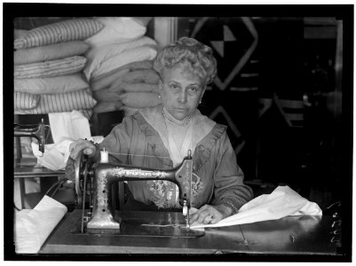 LEGION OF LOYAL WOMEN. MRS. MARY LOGAN TUCKER, SEWING ON BEDDING FOR HOSPITALS LCCN2016869086