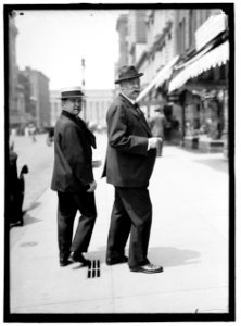 LEDYARD, LEWIS CASS. LAWYER. RIGHT, WITH NEWS CORNER LCCN2016865580