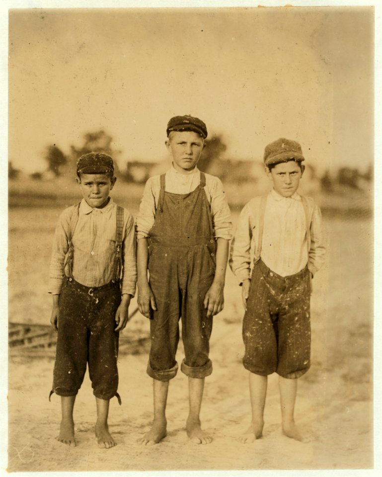 Left hand boy is Broadus McCoy been sweeping one year, Cherry St. Makes 40 cents a day sweeping in the Belton Mfg. Co., Belton S.C. The family bible record said he has just reached 11 years LOC nclc.02611