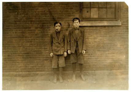 Left hand boy Zeke Gosselin, 95 Main St. Been in mill one year. Other boy Philip Lesard, 68 Elm Street. Been in mill three years. W(or)king in G(rea)t Falls M(anu)f(acturin)g Co. LOC nclc.01750