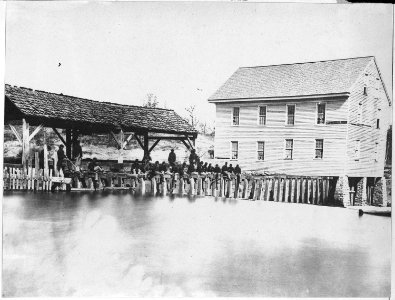 Lee and Gordon's Mills. (View of mill pond, raceway and rear of building.) - NARA - 530452