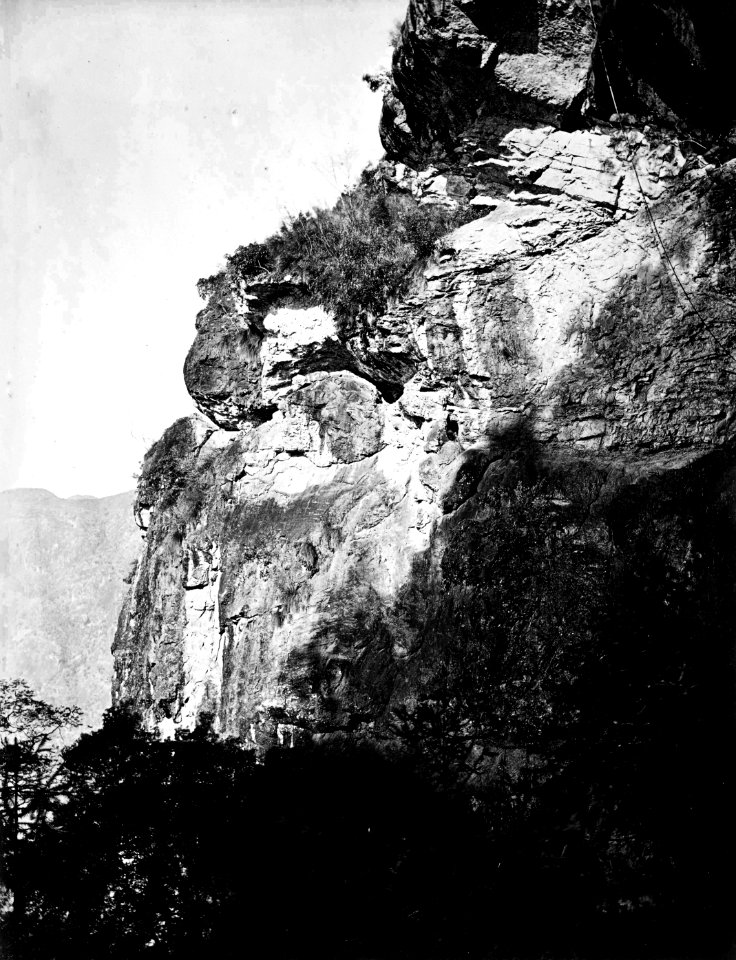 Left shoulder of the cave in which is situated Yuen-foo Monastery