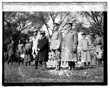 Left to Right- Asst. Secty. War Benedict Crowell, Secty. Baker, General Marsh & Lt. Col. Lent, review of All American Detachment LCCN2016819731