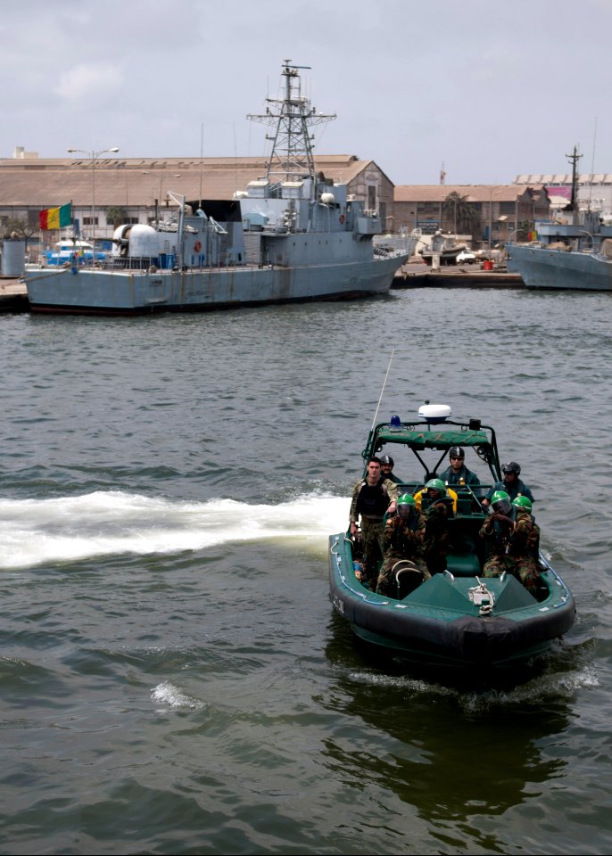 Liberian service members aboard a Spanish Civil Guard boat prepare to board a vessel during maritime interdiction training March 8, 2014, in Dakar, Senegal, as part of exercise Saharan Express 2014 140308-N-QY759-227