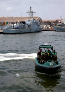 Liberian service members aboard a Spanish Civil Guard boat prepare to board a vessel during maritime interdiction training March 8, 2014, in Dakar, Senegal, as part of exercise Saharan Express 2014 140308-N-QY759-227