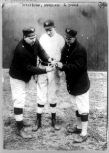 Libeus Libe Washburn, Richard William Rube Marquard, and Mike Donlin of the New York Giants baseball team examining baseball) - Hall, N.Y LCCN89714116