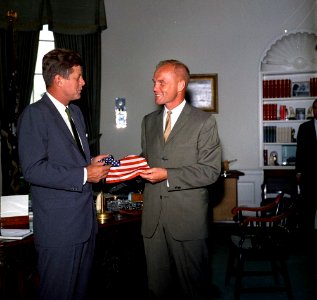 Lieutenant Colonel John H. Glenn, Jr., Presents a Gift to President John F. Kennedy photo