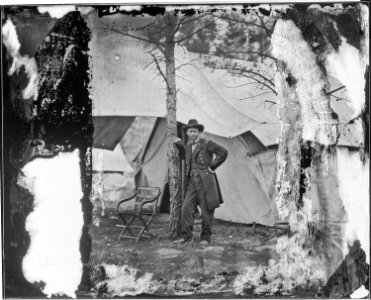 Lieutenant General Ulysses S. Grant Standing by a Tree in Front of a Tent, Cold Harbor, Virginia. (3995287533)
