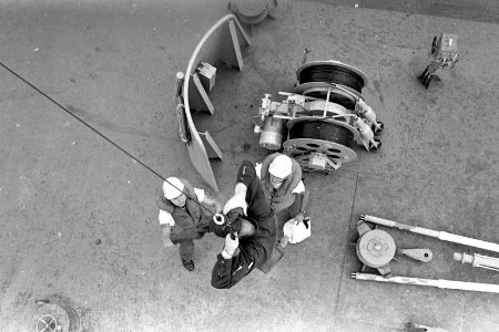 Lieutenant Commander Thomas A. Tucker, U.S. Navy, is lowered to USS Towers (DDG-9) in the Gulf of Tonkin on 31 August 1966 (142664351)