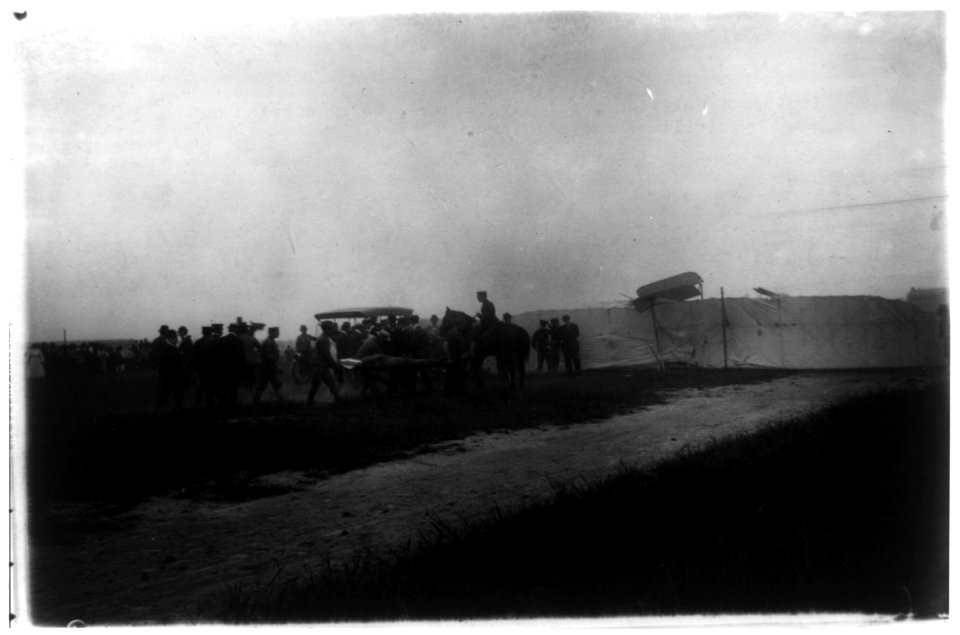 Lieutenant Selfridge, fatally injured, being carried out by civilians and soldiers LCCN2002721854