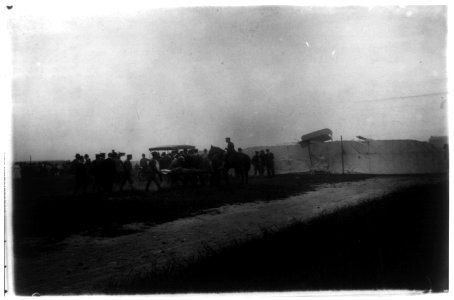 Lieutenant Selfridge, fatally injured, being carried out by civilians and soldiers LCCN2002721854