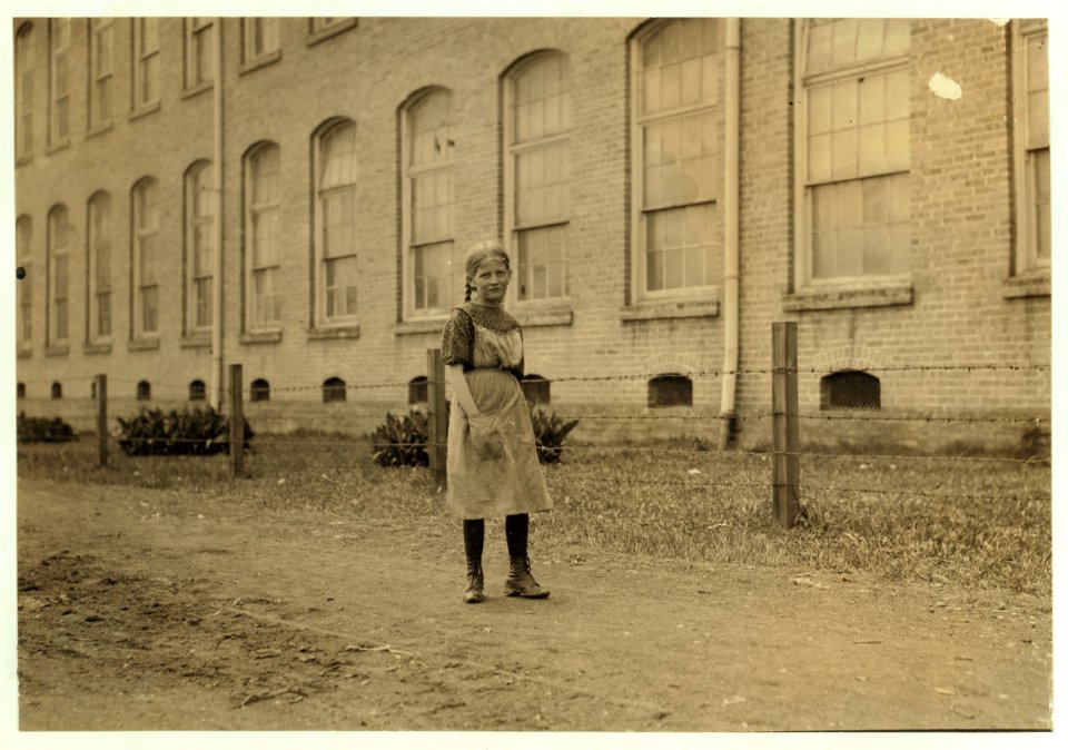 Lillian Nettles, an eleven year old spinner in Magnolia Cotton Mills, Magnolia, Miss. Her sister said, ' She ain't old 'nuff to draw pay,' but she helps regularly, and says she can run two LOC nclc.02083
