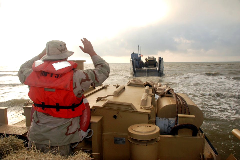 Light amphibious re-supply cargo vehicle delivers hay to stranded cows on Galveston beach DVIDS117366