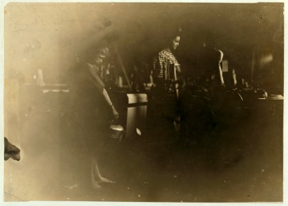 Lincoln Cotton Mills, Evansville, Ind. Girl at Stafford Loom. Boys sprinkling floor. (See report of conditions under which they work.) LOC nclc.01335