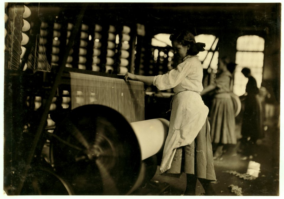 Lincoln Cotton Mills, Evansville, Ind. Girls at weaving machine; warpers. LOC nclc.01336