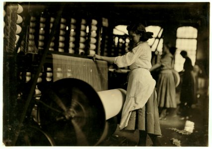 Lincoln Cotton Mills, Evansville, Ind. Girls at weaving machine; warpers. LOC nclc.01336