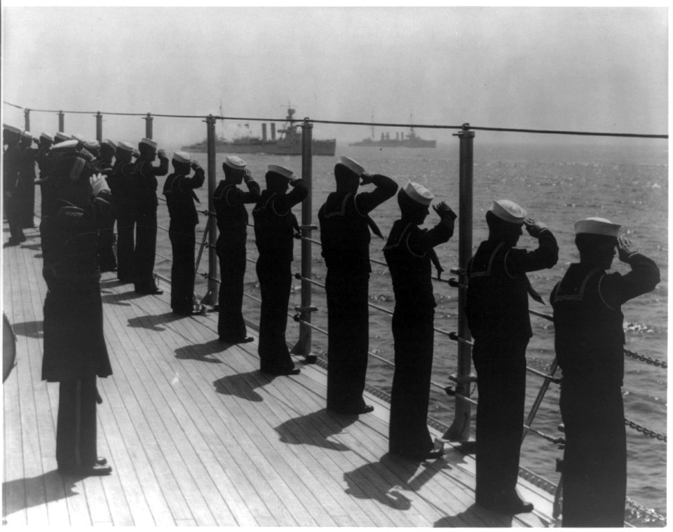 Line of sailors along ship railing giving hand salute. ca. 1913-1921. LCCN2016648007
