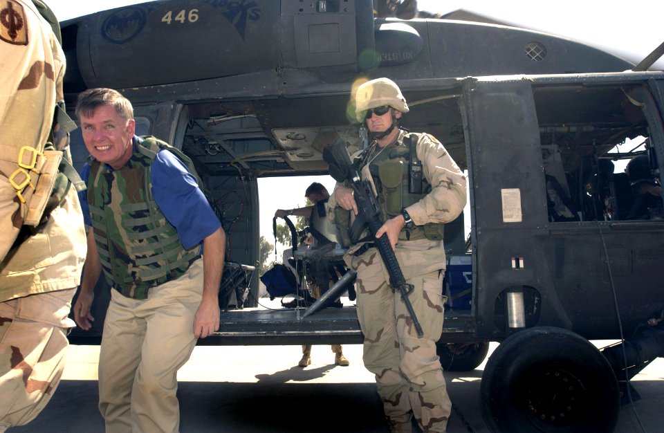 Lindsey Graham leaves a US Army Black Hawk Helicopter