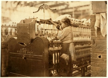 Little spinner in Bibb Mill No. 1, Macon, Ga. She was so small she had to climb up on to the spinning frame to mend broken threads. See also photo 488. Jan. 19, 1909. LOC cph.3a32051