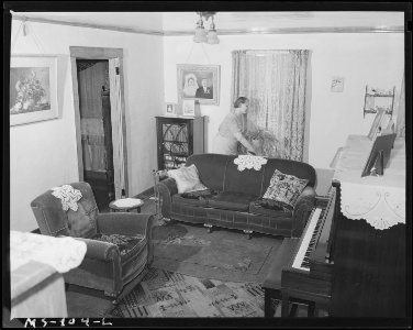 Living room of home of Andrew Orlosky, miner, living in company housing project. Buckeye Coal Company, Nemacolin... - NARA - 540273