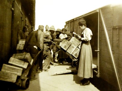 Loading a railroad car with rations, Dijon, France, AEF, WWI, 1918 (30477195970) photo