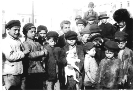 Little neapolitan street boys ready to embark on kindergarten ship Caracciolo