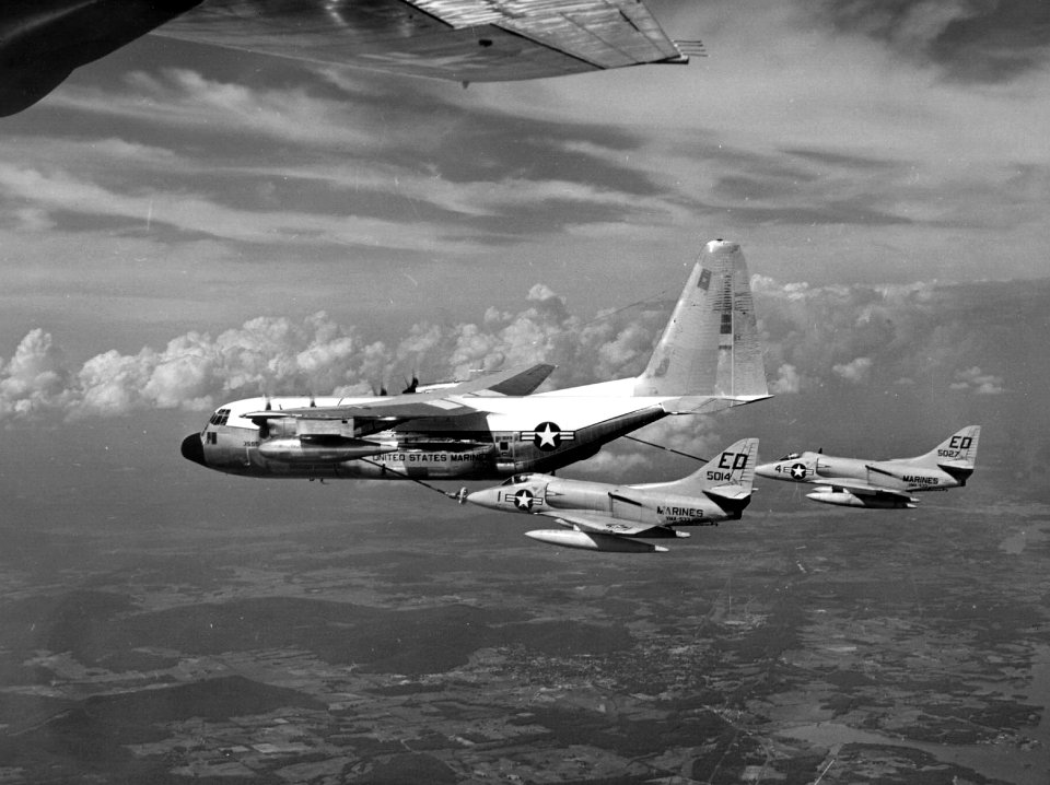 Lockheed GV-1 Hercules refuels Douglas A4D-2N Skyhawks of VMA-533 on 15 March 1961 (NNAM.1996.253.5684)