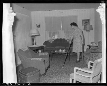 Living room in home of miner who lives in company housing project. Columbia Steel Company, Columbia Mine, Columbia... - NARA - 540509 photo