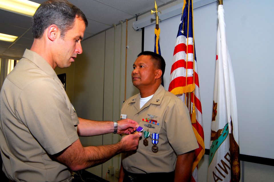 Logistics Specialist 1st Class Gerardo Dacasin receives a Purple Heart. (8552911058)
