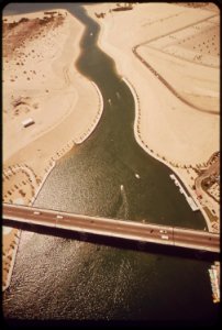 London-bridge-crosses-havasu-lake-at-lake-havasu-city-rescued-from-demolition-by-an-american-buyer-the-famous-old-span-was-transplanted-here-in-1971-may-1972 7136473819 o