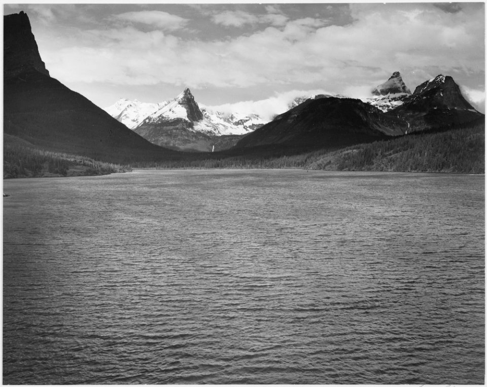 Looking across toward snow-capped mountains, lake in foreground, St. Mary's Lake, Glacier National Park, Montana., 193 - NARA - 519856