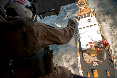 Looking down on the USCGC Baranof from a USN helicopter COMBAT CAMERA 140221-N-QP268-293