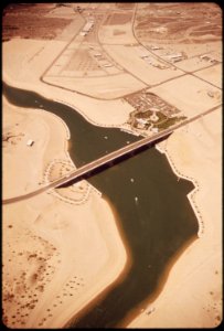 London-bridge-crosses-arm-of-havasu-lake-at-lake-havasu-city-rescued-from-demolition-by-an-american-buyer-the-famous-old-span-was-transplanted-here-in-1971-may-1972 7136480519 o