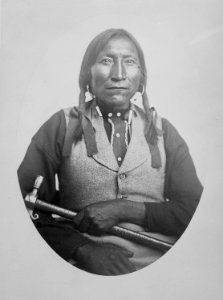Lone Wolfe (Guipago), a Kiowa chief, half-length, seated, 1868 - 1874 - NARA - 518903
