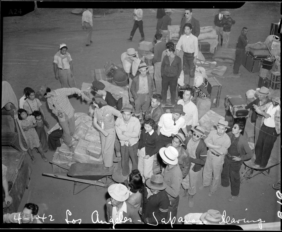 Los Angeles, California. Evacuees of Japanese ancestry entraining for Manzanar, California, 250 mil . . . - NARA - 536768