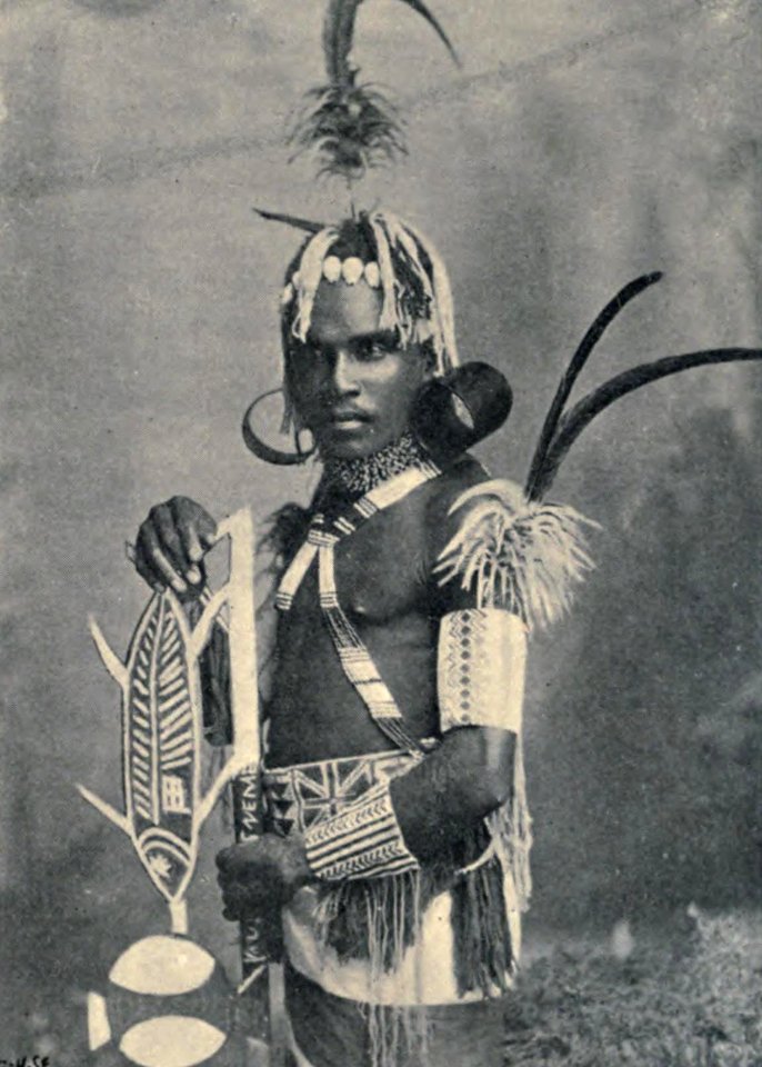 Loyalty Islander in festive costume, c, 1890s