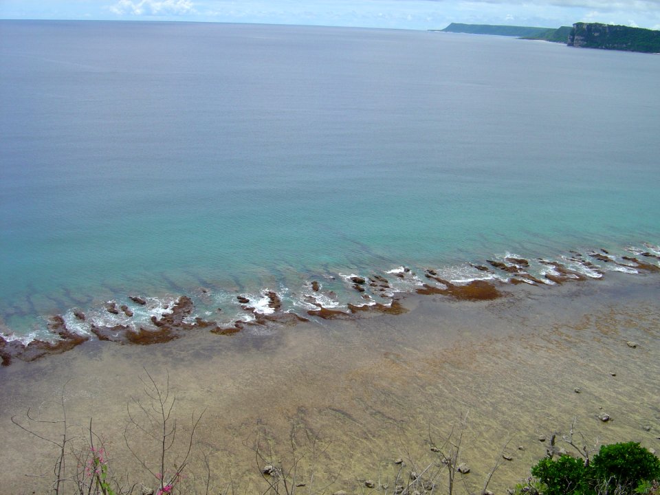Low tide on the Guam reef (line379280818)