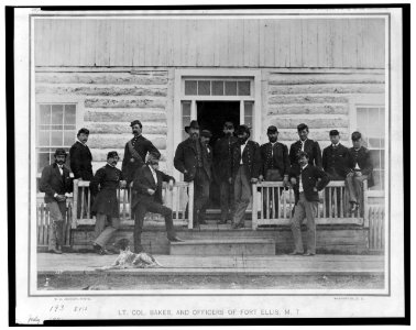 Lt. Col. Baker and officers of Fort Ellis, Montana (posed in front of building) LCCN2006679876
