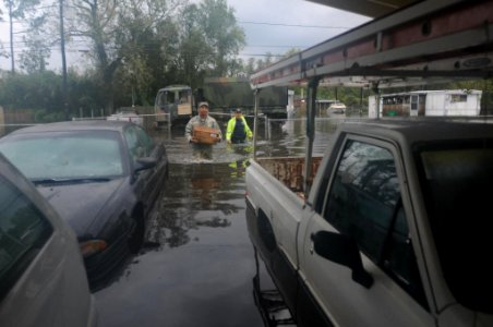 Louisiana National Guard bring MREs to flooded LaPlace Louisiana after Hurricane Isaac, 30 August 2012