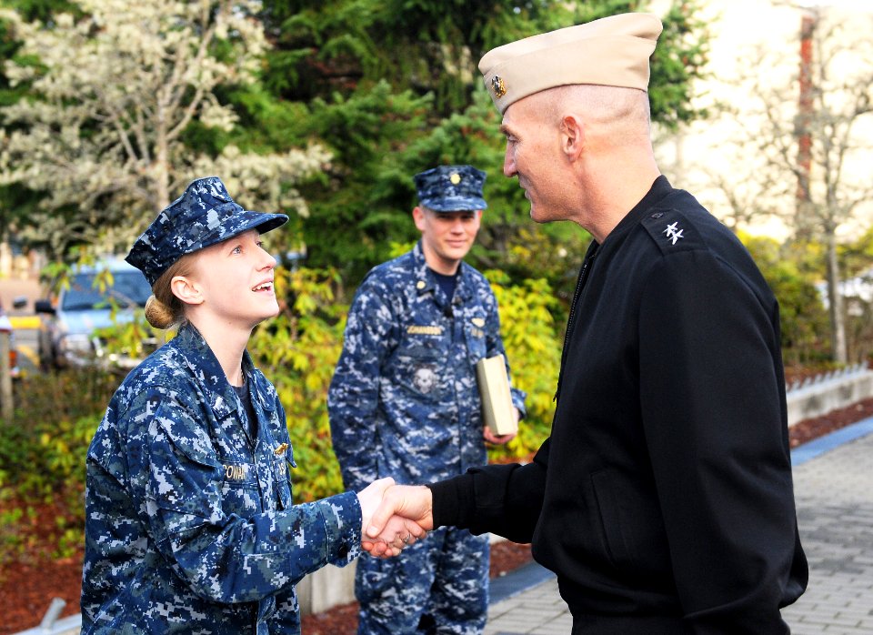 Lt. j.g. Cowan is congradulated after receiving her dolphins. (8249001357)