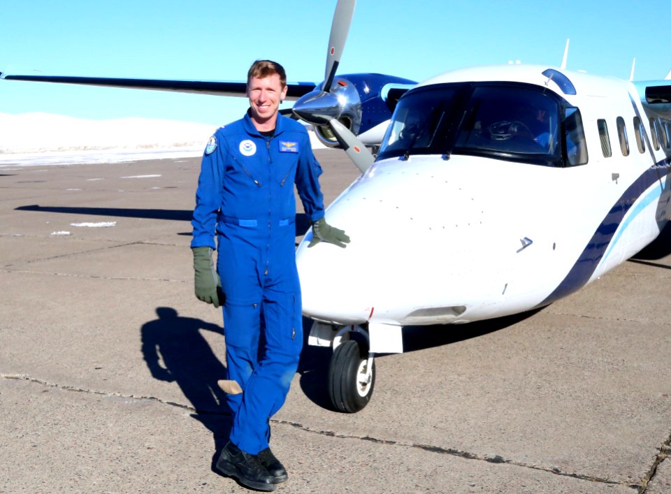 Lt. j.g. Kevin Doremus with NOAA's Gulfstream 'Jet Prop' Tubo Commander (N45RF)