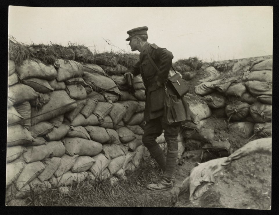 Lucian Swift Kirtland leaning against sandbags in trench LCCN2012646951