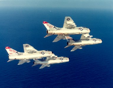 LTV A-7E Corsair IIs of VA-147 in flight over the Indian Ocean on 14 November 1974 (NNAM.1996.253.7103.014)