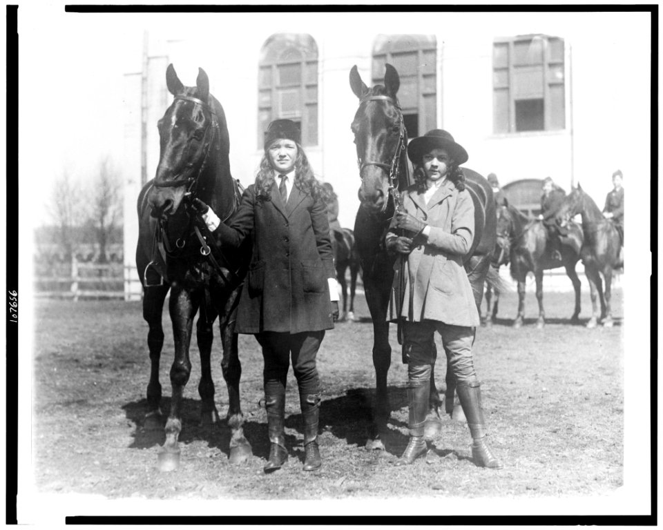 Lucy Leffingwell, daughter of Russell C. Leffingwell, and Carolyn Chamberlain, daughter of General J.C. Chamberlain, posed with their horses, probably in New York City area LCCN93507038