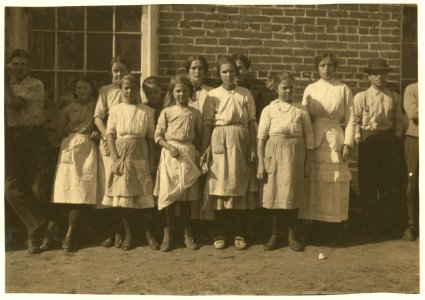 Lumberton Cotton Mills. I saw all the children in this photograph coming out and going in to work when the whistle blew, and they said they worked. LOC nclc.02977