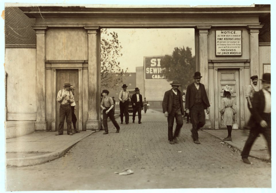Lunch hour. Singer Mfg. Co., The boys works there- girl carries lunch. LOC nclc.04497
