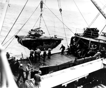LVT(A)-4 is hoisted from USS Hansford (APA-106) off Iwo Jima 1945